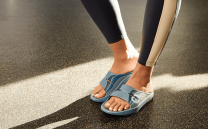 Women's OOahh Sport Slide Sandal - Ocean Blue Wave women staning in gym | lifestyle